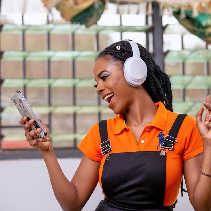 Alex Carter, Lead Design Curator at HiddenRiverAlliance, reviewing corporate floral arrangements